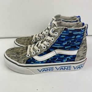 Vans Off the Wall zip up shoes.